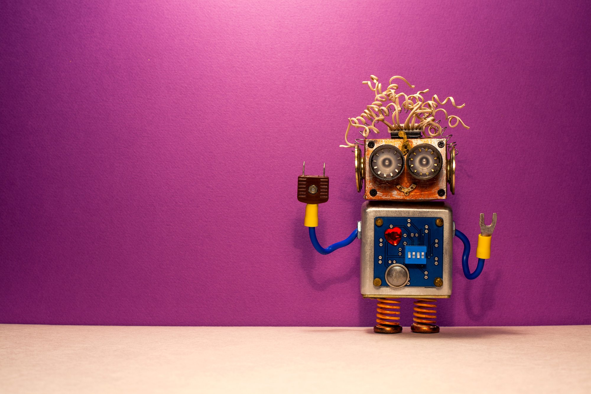 funny-steampunk-robotic-toy-on-purple-background-AAYBWTL